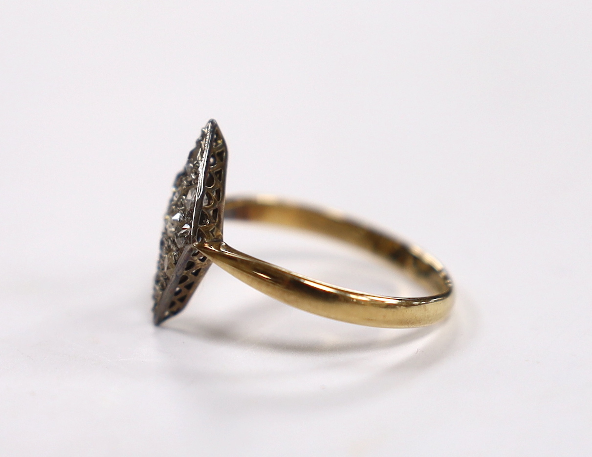 A late Victorian 18ct and diamond set diamond shaped cluster ring, size P, gross weight 2.7 grams.